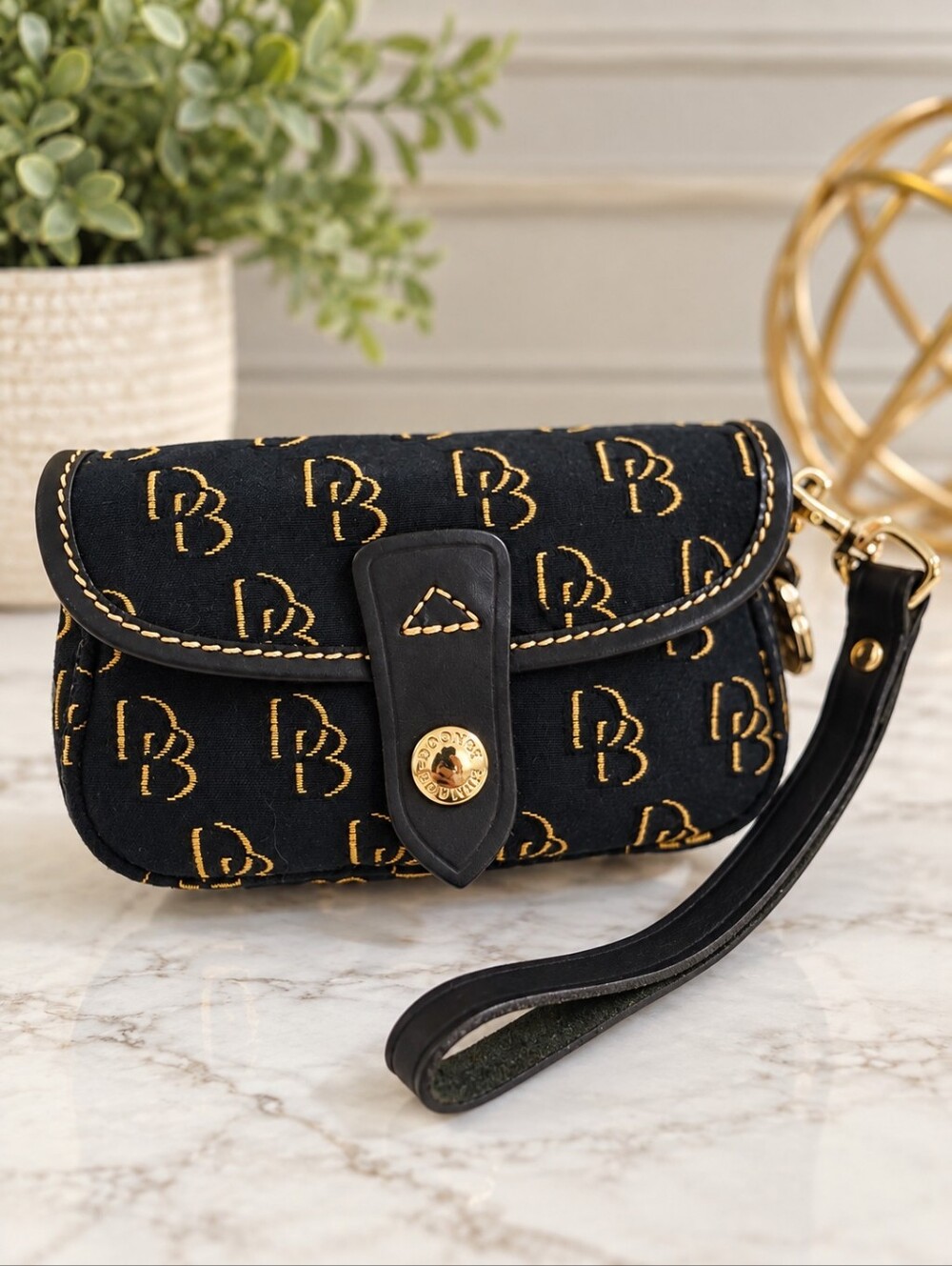 Dooney & Bourke 1975 Signature Monogram Flap Wristlet Clutch Black Gold EUC